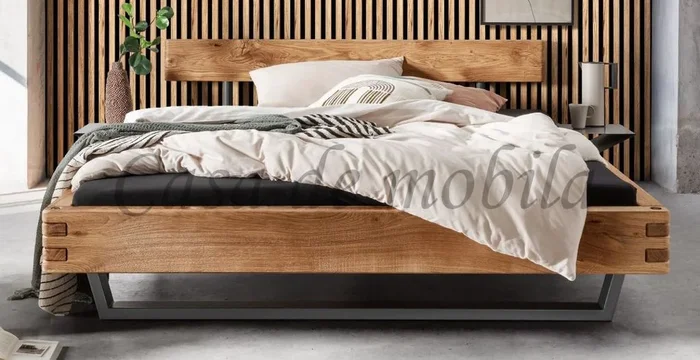 Balkenbett Woodstock gerundet Wildeiche massiv natur geölt mit Metallkufen und Balkenkopfteil Doppelbett Schwebebett